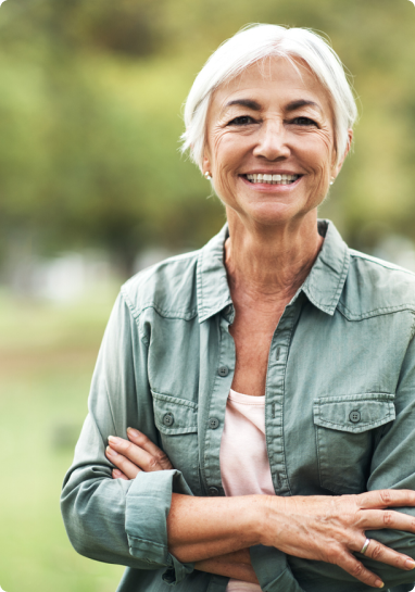 woman-smiling-with-arms-crossed Premier Senior Living in Lake County | AVIVA Merrillville